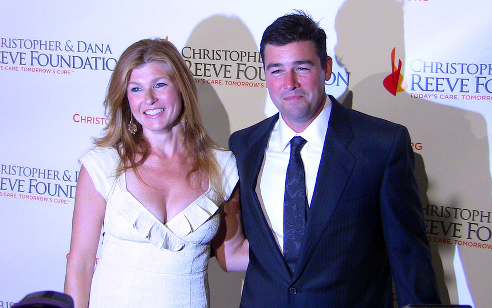 Actors pose together at a Christopher & Dana Reeve Foundation event step and repeat